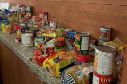 A group non-perishable food items on a counter top